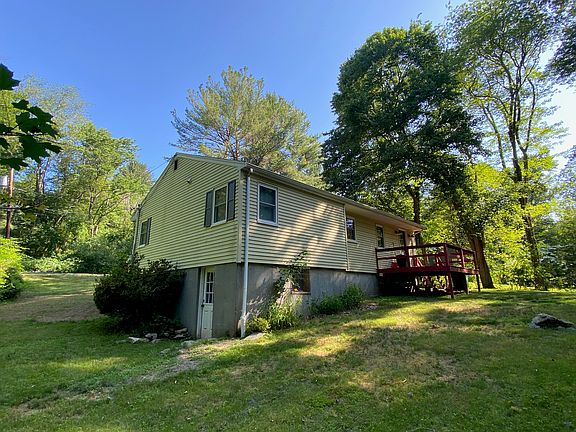 Side of house and door to basement