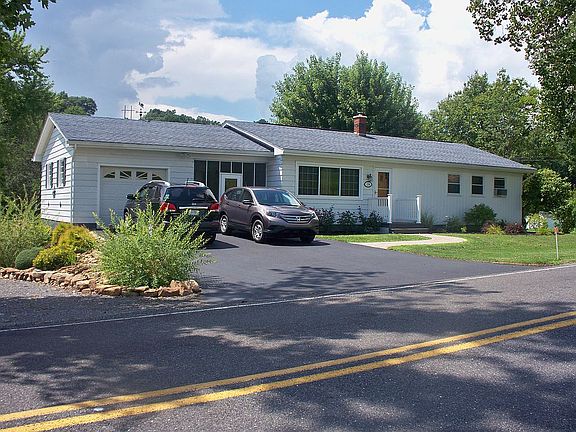 Front & Southeast end/Garage