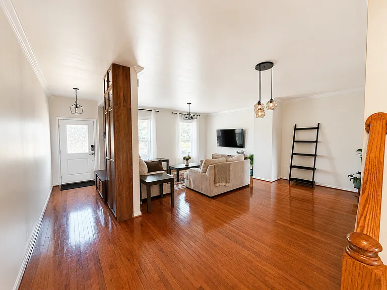 Bright, Spacious Living Room with Comfortable Sofa Seating