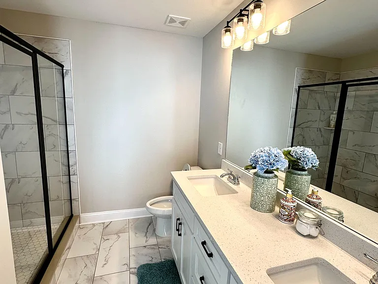 master bedroom with private bathroom