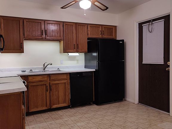 Sink and refrigerator wall