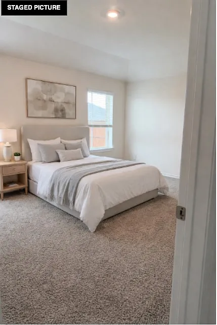 Master Bedroom staged by AI - 4105 Malachite Dr