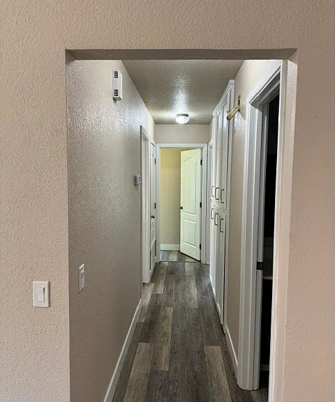 Hallway to 3 bedrooms