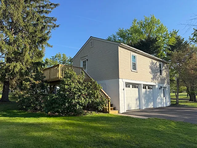 Brand new stairs and deck to the upper level apartment.