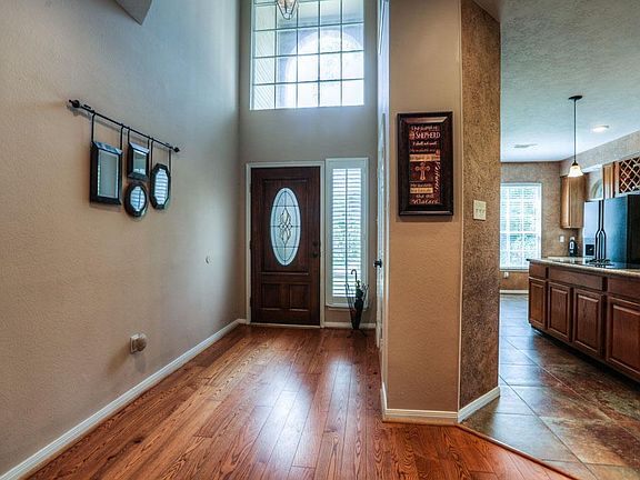 Walk into a Grand Entry with Soaring Ceilings