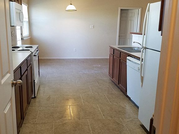 Kitchen dining to the right open livingroom