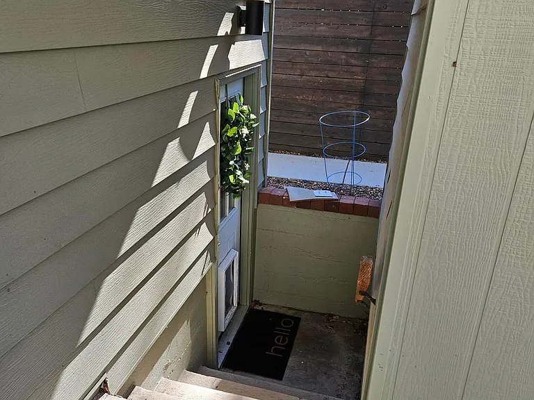 Steps to access garden level dwelling.