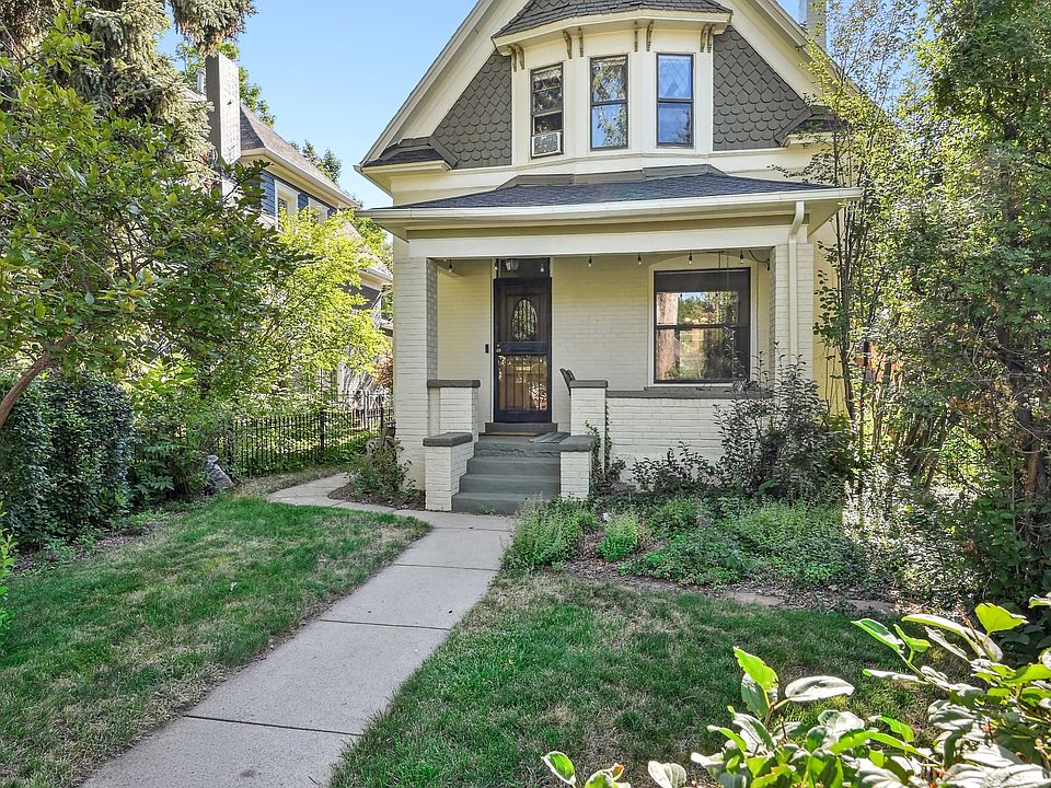 Exterior, front porch; newly painted exterior