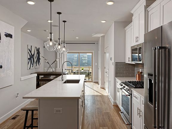 The Baywood Kitchen Features Stainless Steel Appliances and Plenty of Countertop Space in this New H