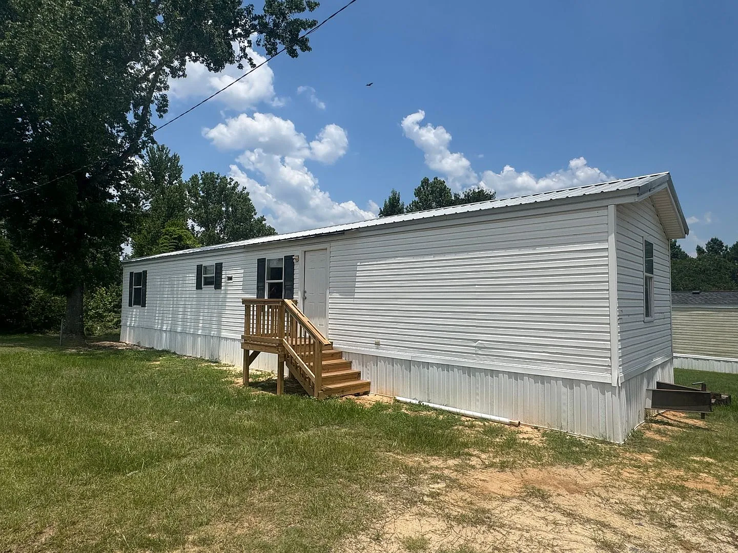 Charming 3/1 Mobile Home in Quiet Park w/ Well, Septic, & Lawn Maintenance — Photo 1