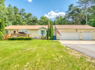 7910 N Reed Rd, Howard City, MI 49329