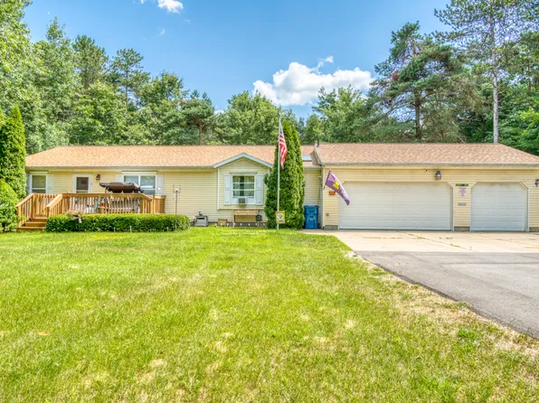 7910 N Reed Rd, Howard City, MI 49329