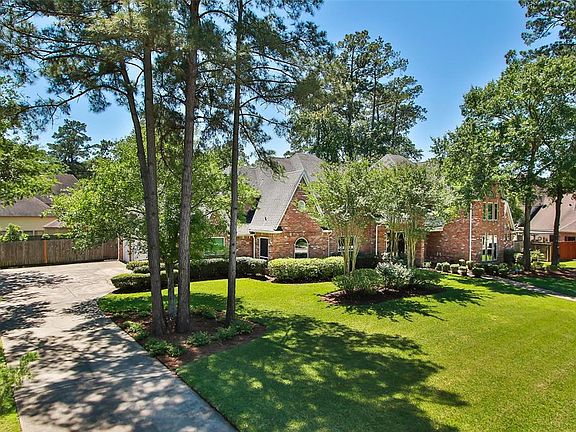 This home features a three car garage, double lot, stunning landscaping, mature trees and so much more