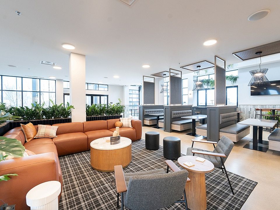 Experience the perfect blend of comfort and style in this modern apartment lounge.