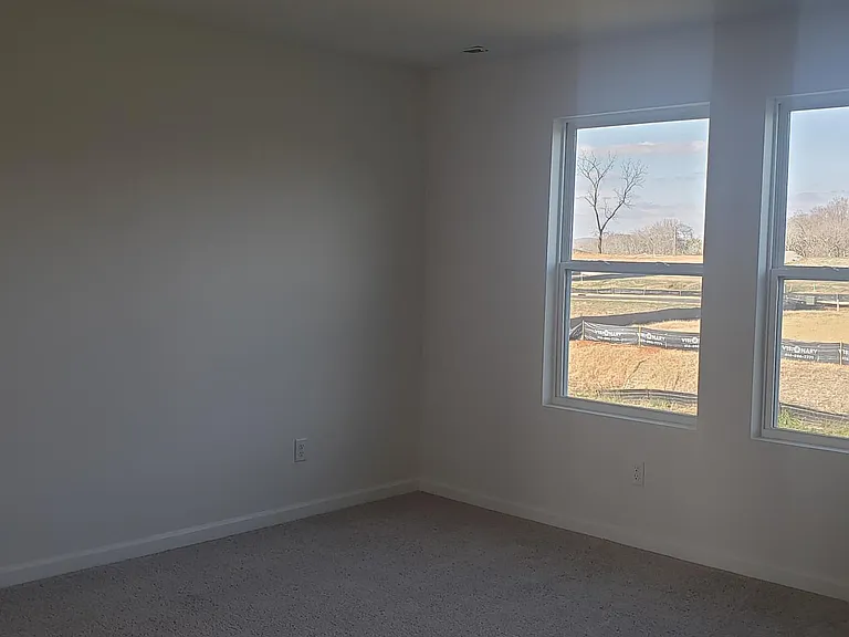 Owner's suite looking out over backyard.