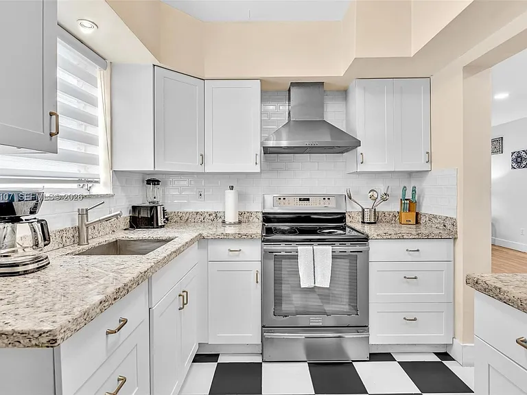 10002 E Bay Harbor Dr #2 — Photo 7