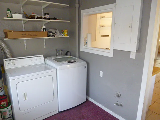 Laundry room with washer and dryer