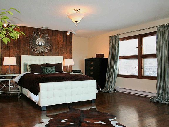 Master suite  Amenities include private bath, oak floors and more great views.