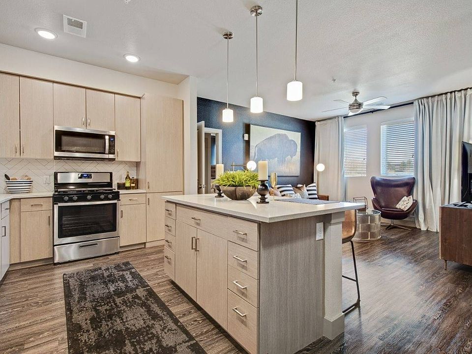 Trendy and Open Living Room and Kitchen