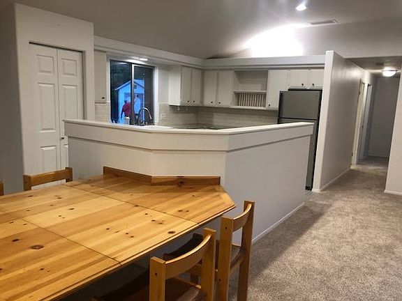 Great room lay out with attached table and six chairs
