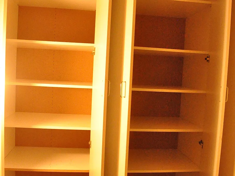 Enormous pantry in storage space with 15 foot ceilings.