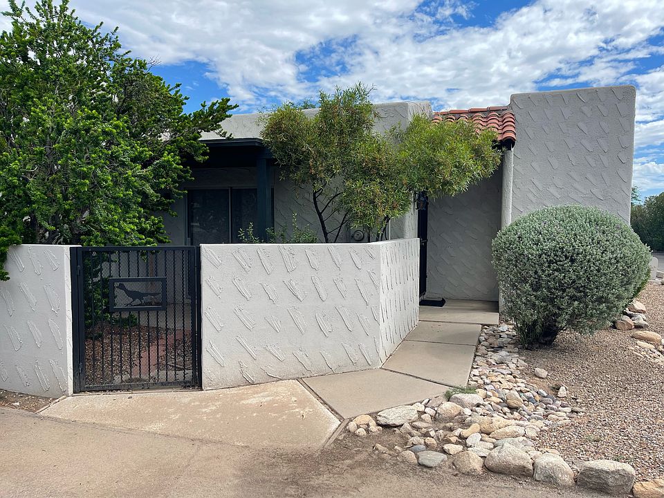 Front entrance with covered parking just to the left second parking space in front.