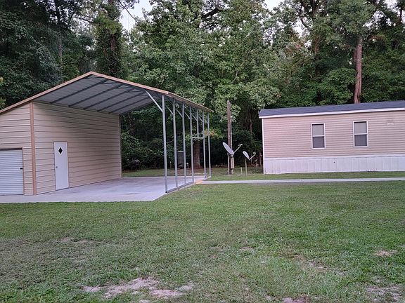 RV carport with rollup garage