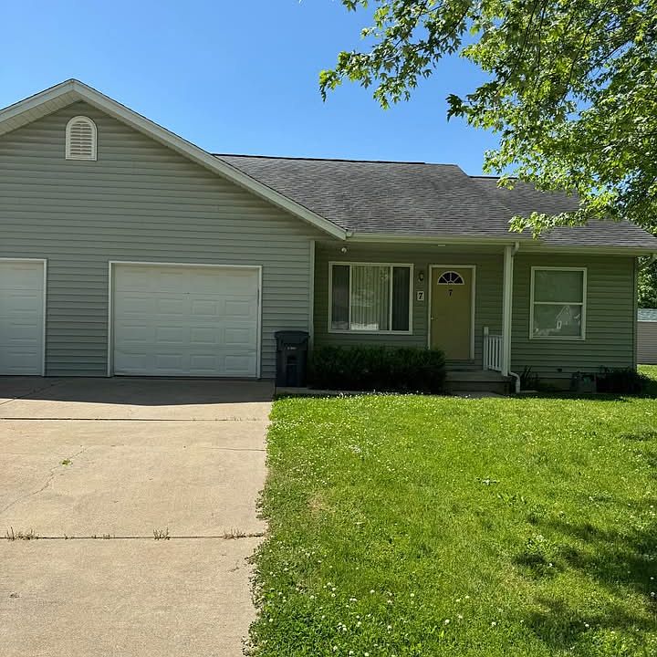 Front of the house and shared driveway