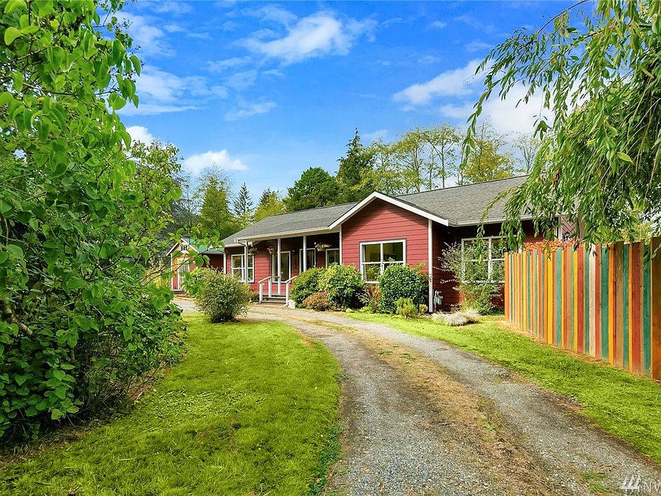 Berries, fruit trees, herbs, rhubarb, on and on. An incredible organic garden!!