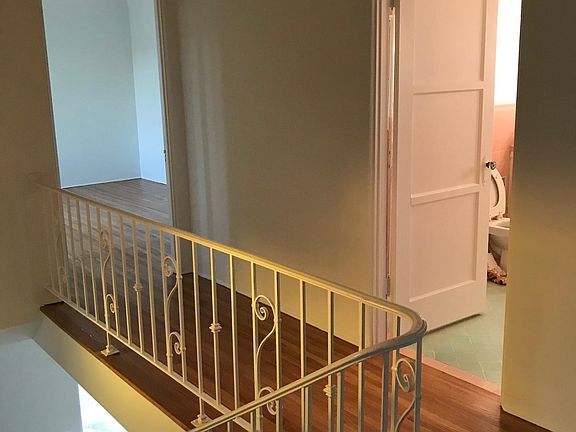 Lots of light, closets have built in vanity and porches. Su