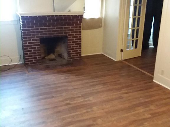 Living room with new hardwood laminate flooring