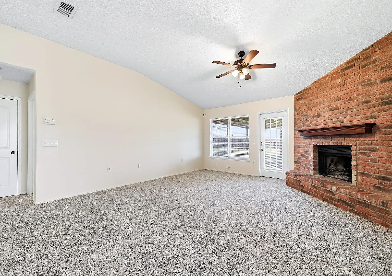 Beautiful Brick-Front Home with Spacious Living Areas & Private Backyard — Photo 2