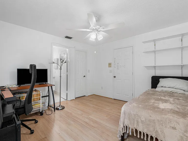 7087 NW 78th Pl — Photo 25