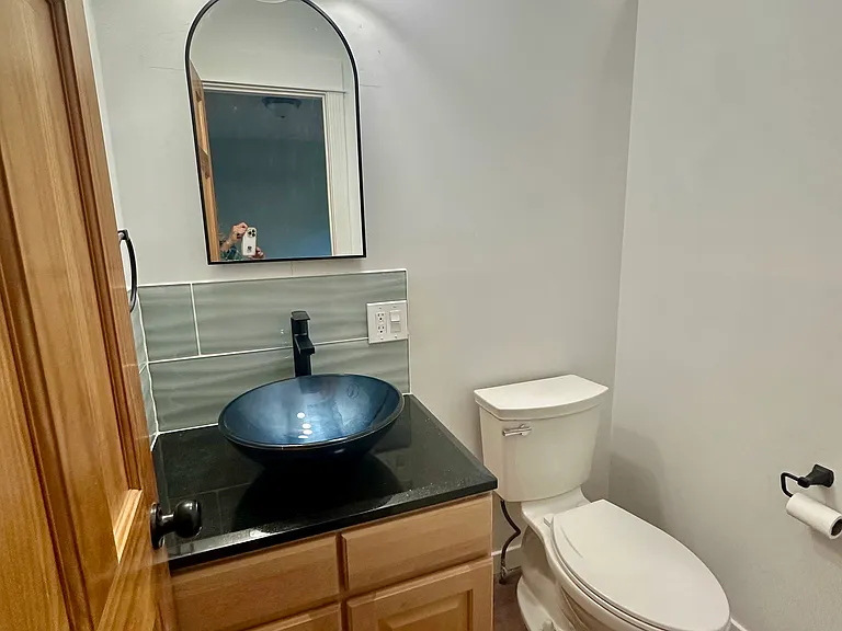 Ensuite bath has sun tunnel for extra light