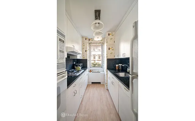 Sold by Douglas Elliman | media 18