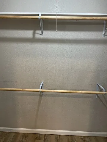 Double clothes poles in all bedrooms for extra storage space