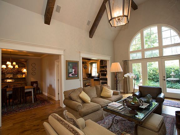 Living area showing vaulted beamed ceiling