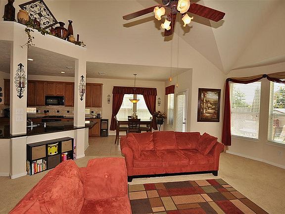 The island kitchen is open to the family room. Great for entertaining!