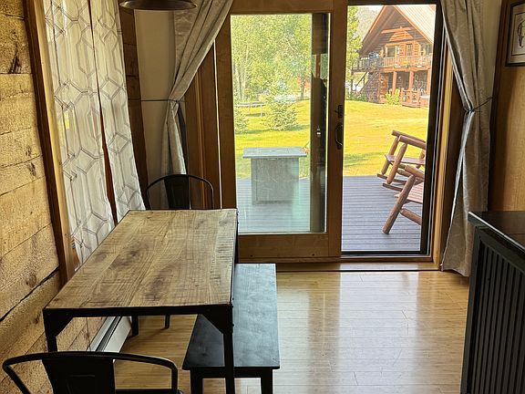 Dining area near sliding glass door to back deck
