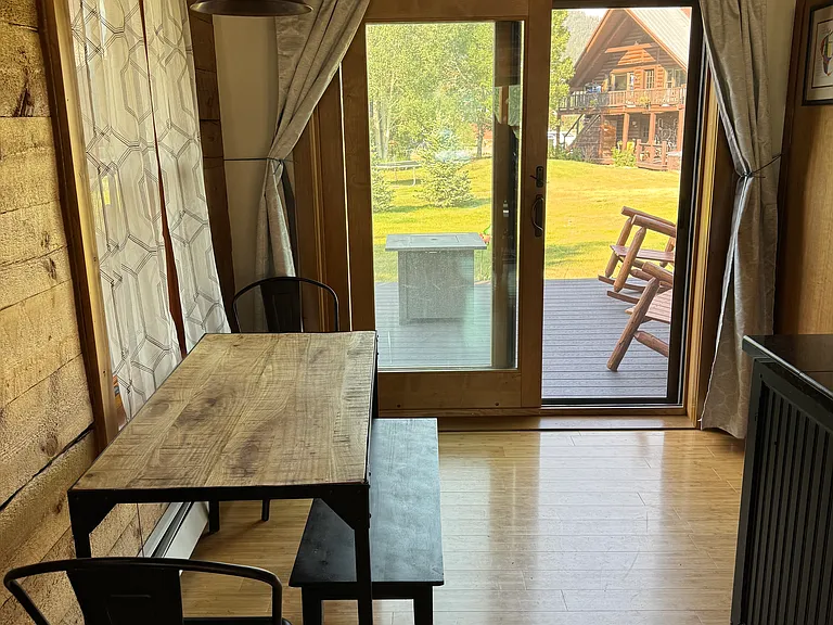 Dining area near sliding glass door to back deck