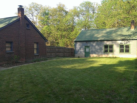 Fenced yard and barn