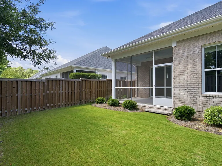 Another view of the fenced-in backyard