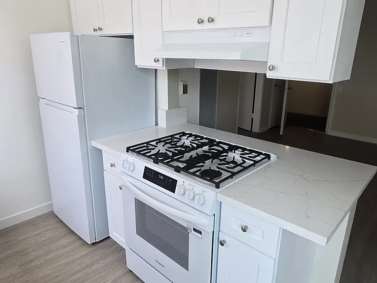 #205 - ALL NEW KITCHEN & BATHROOM! $1925 with Rent Special: Half-off One Month's Rent!