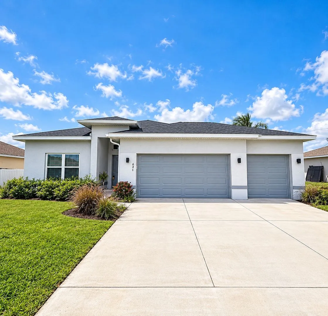 Brand-New 4-Bedroom Cape Coral Home with 3-Car Garage & Designer Upgrades! — Photo 1