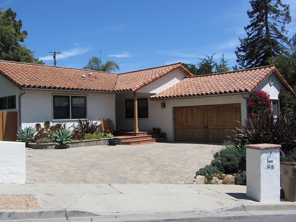 Great curb appeal with 2-car garage and drought tolerant landscaping.