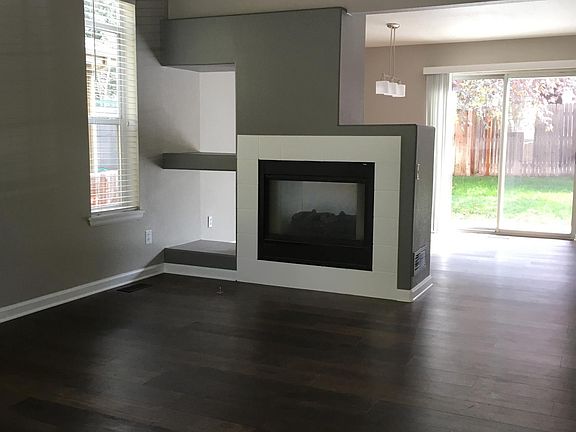 Family room with double sided fireplace