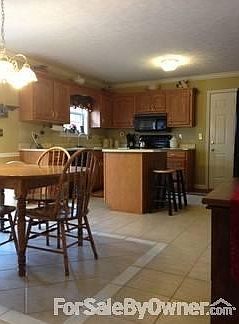 Beautiful tile & kitchen
						:
						Your guests will gather around this island ...perfect party home, or just relax