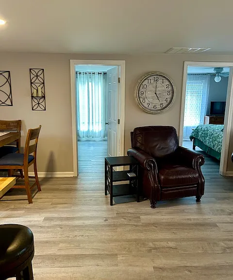 View of entrance to both bedrooms. They both have window AC units