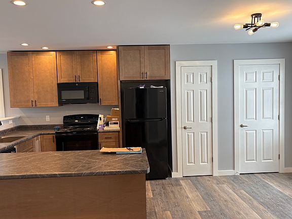 Kitchen with pantry and coat closet