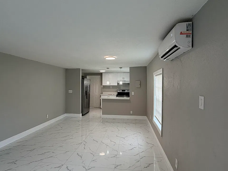 605 NW 9th Ave